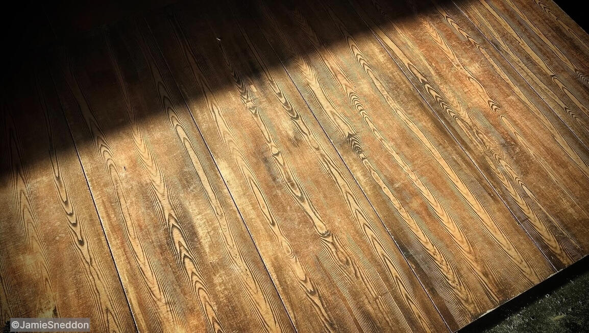 Pinocchio Unstrung: Geppetto’s Workshop build - the 22 flats were made with 35 4ft x 8ft ply boards that i routed grooves into for the plank effect and then painted to look like oak boards,